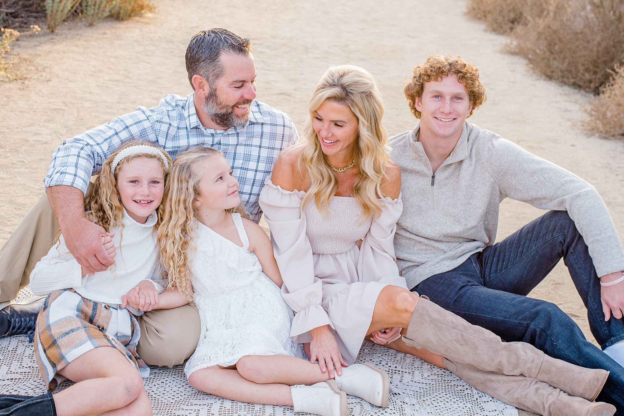 family laugh together during Carlsbad CA Sunset Family Session