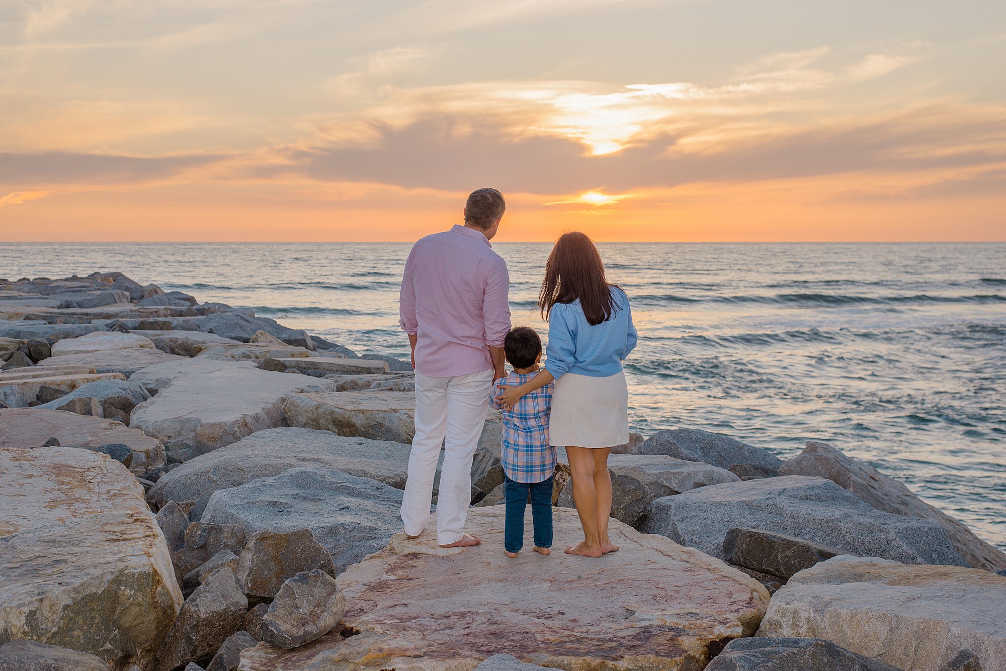 sunset family portaits on beach in Carlsbad, CA photographed by San Diego Family photographer 