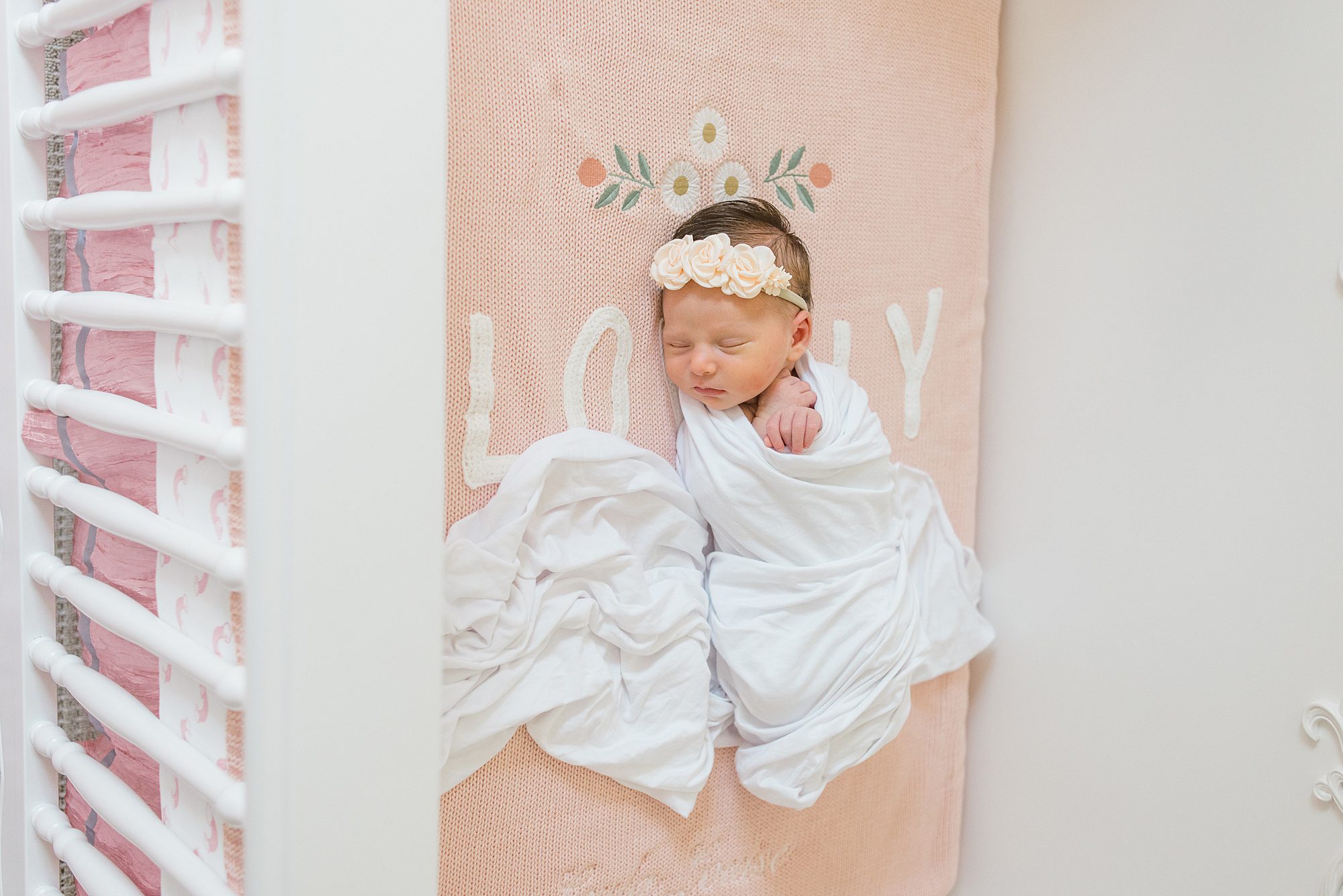 Timeless Newborn Portraits of baby girl in dainty nursery