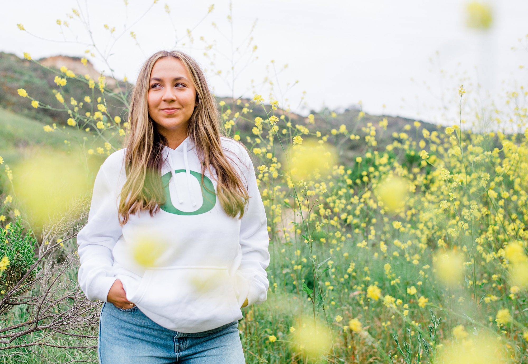 senior girl portrait session in California field of wildflowers 