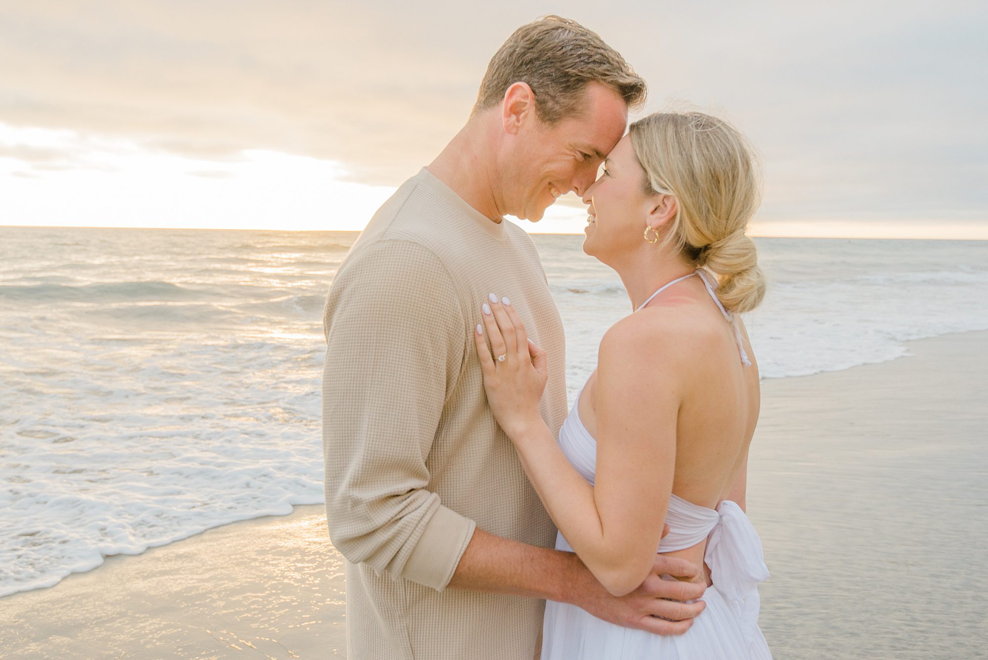 romantic San Diego couple portraits from beach session captured by Leigh Castelli, a San Diego family photographer 