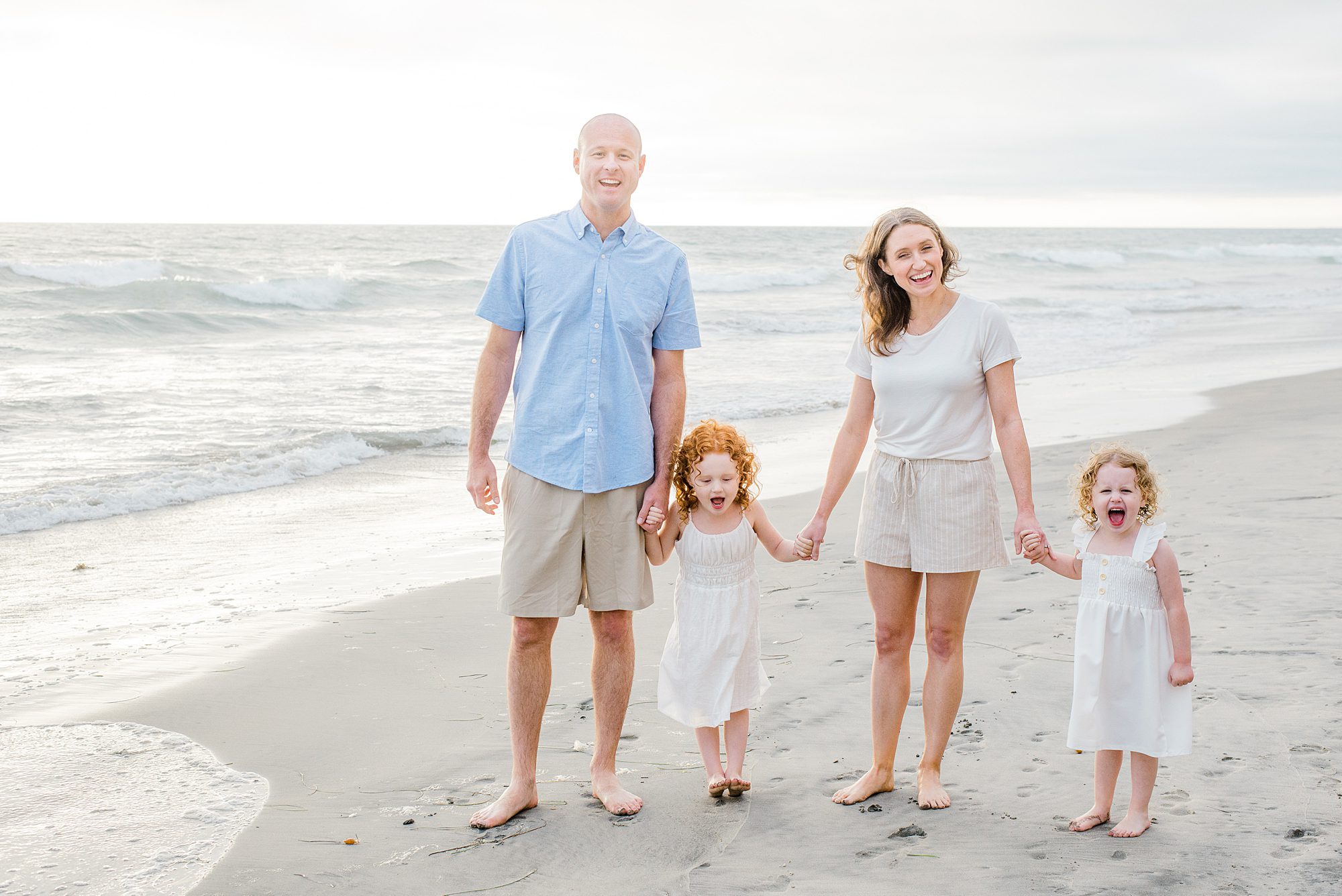 family of four during Gorgeous Family Beach Session