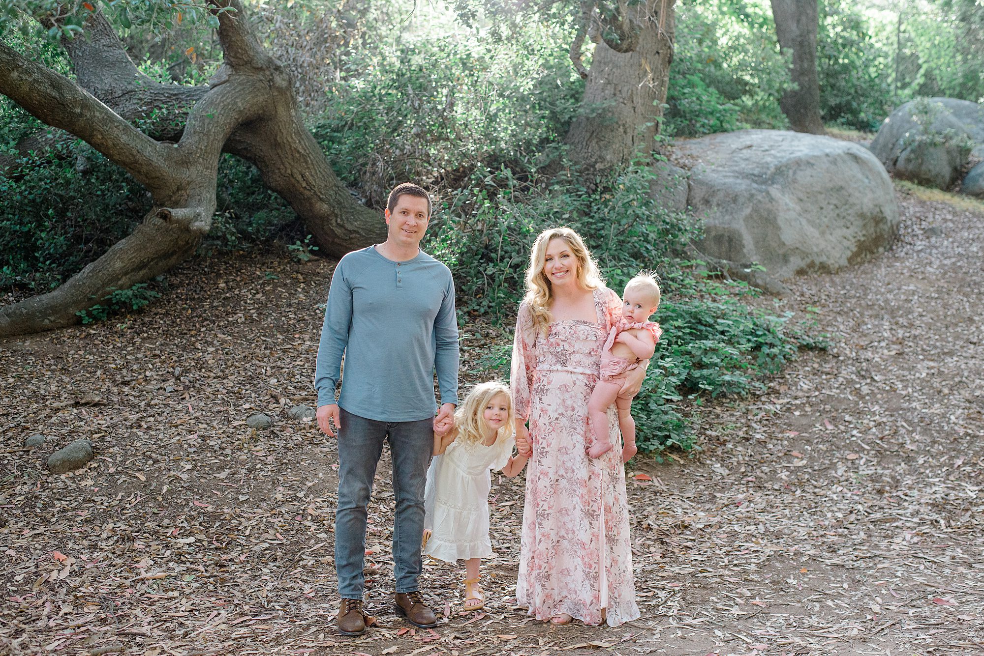 family of four in the woods during North County San Diego Family Session