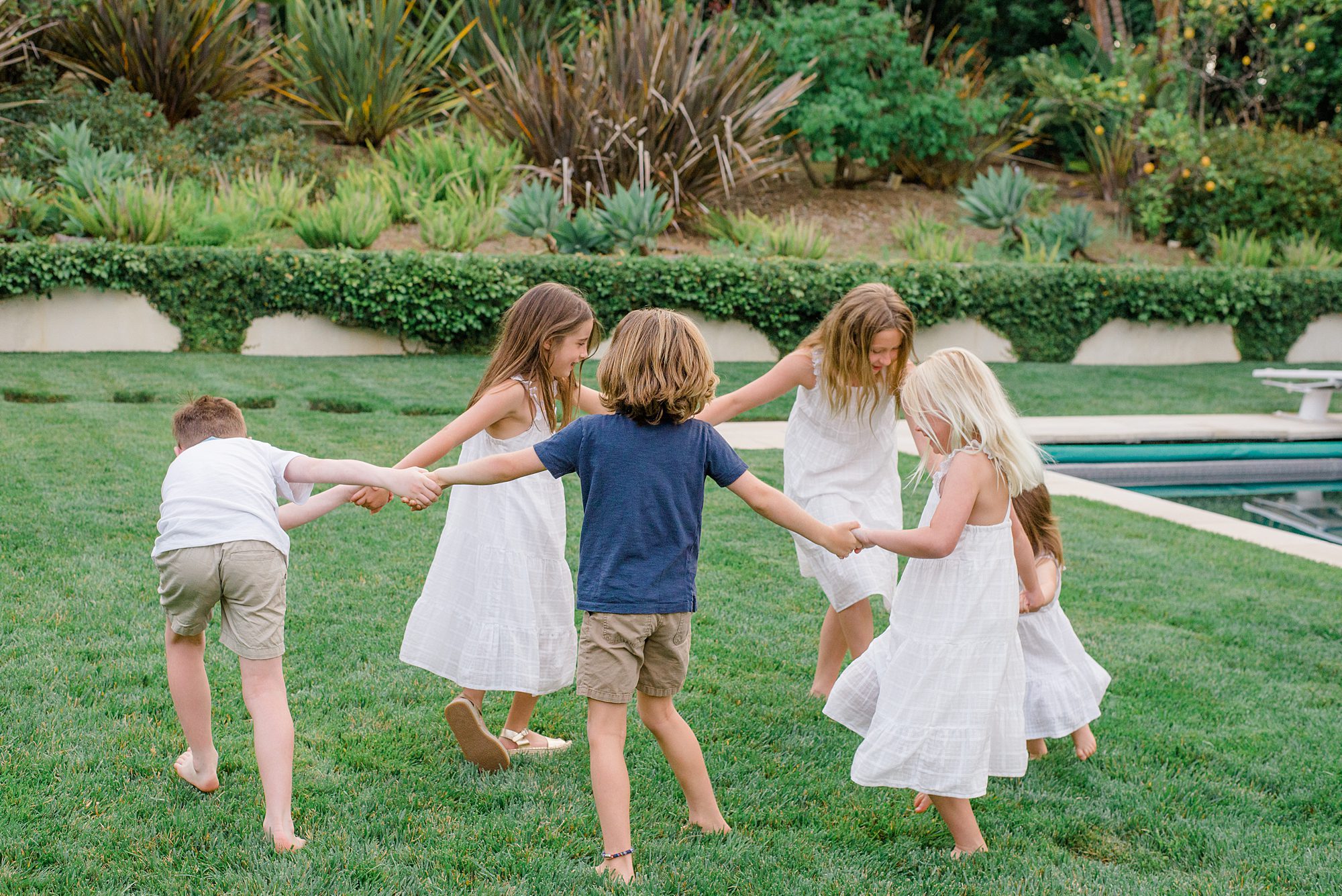 candid portraits of cousins during Summer Extended Family Session in Rancho Santa Fe, California