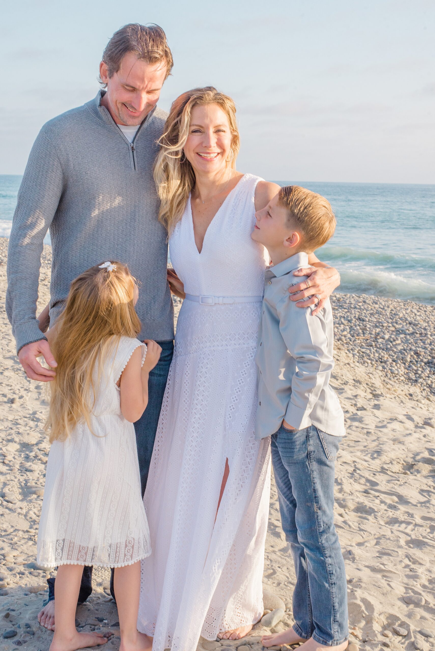 family of four during California Coastline Beach Session in Carlsbad, CA 