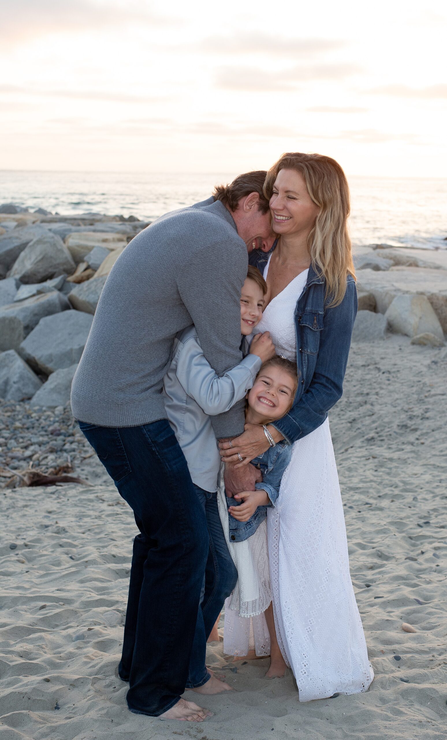 candid family portraits from California Coastline Beach Session in Carlsbad, CA 