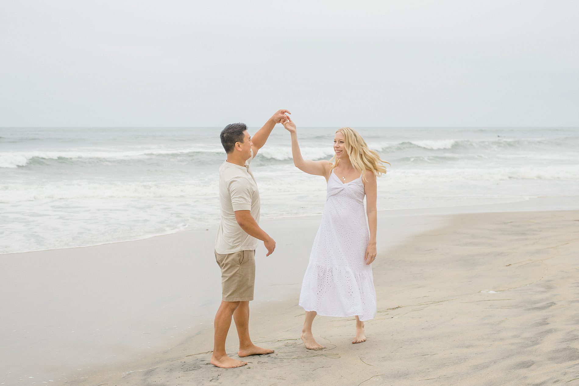 couple dance on the beach in San Diego