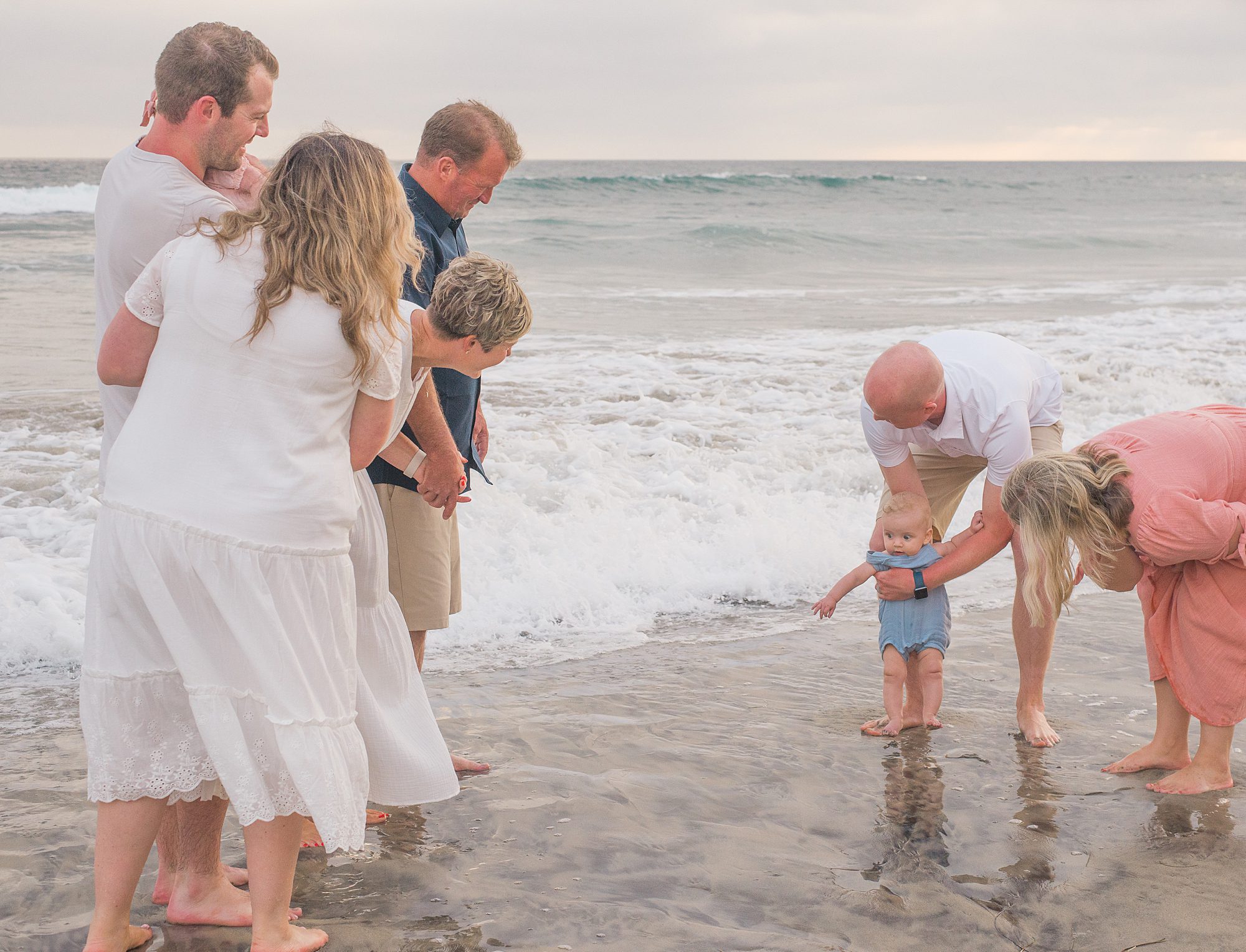 candid family portraits on the beach