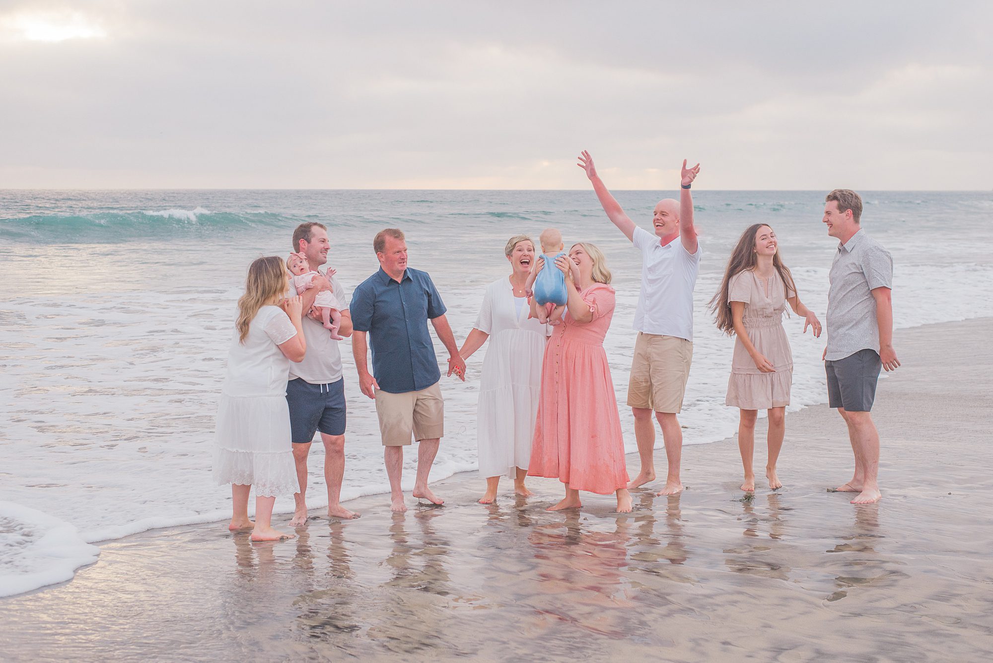 candid family portraits from Extended Family Sunset Session in Oceanside, CA 